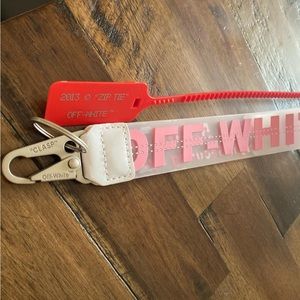 Pink and clear “Off white” keychain and shoe tag.